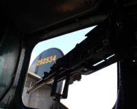 The left waist gun. Some crews had two designated waist gunners; in other crews the radio operator would double as such. On the inside of the fin is the radio call number, which the crew would use to identify their aircraft when approaching an airfield.