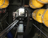 This is the rear fuselage. Directly below is the belly hatch, the primary entrance and exit point to and from the waist. Oxygen cylinders line the sides, and the tail turret is at the far end.